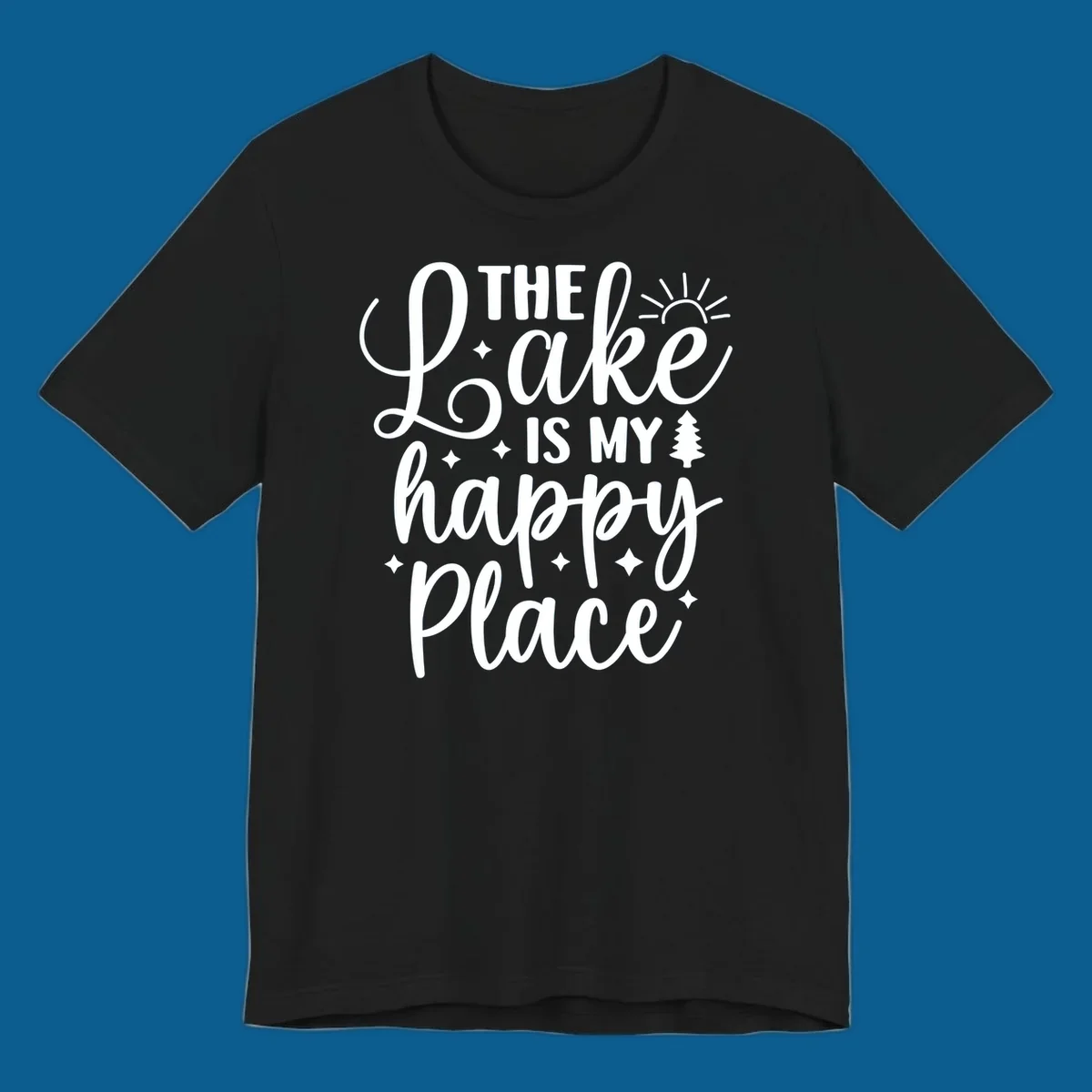 The Lake Is My Happy Place text and graphic design with sun, stars, and tree.
