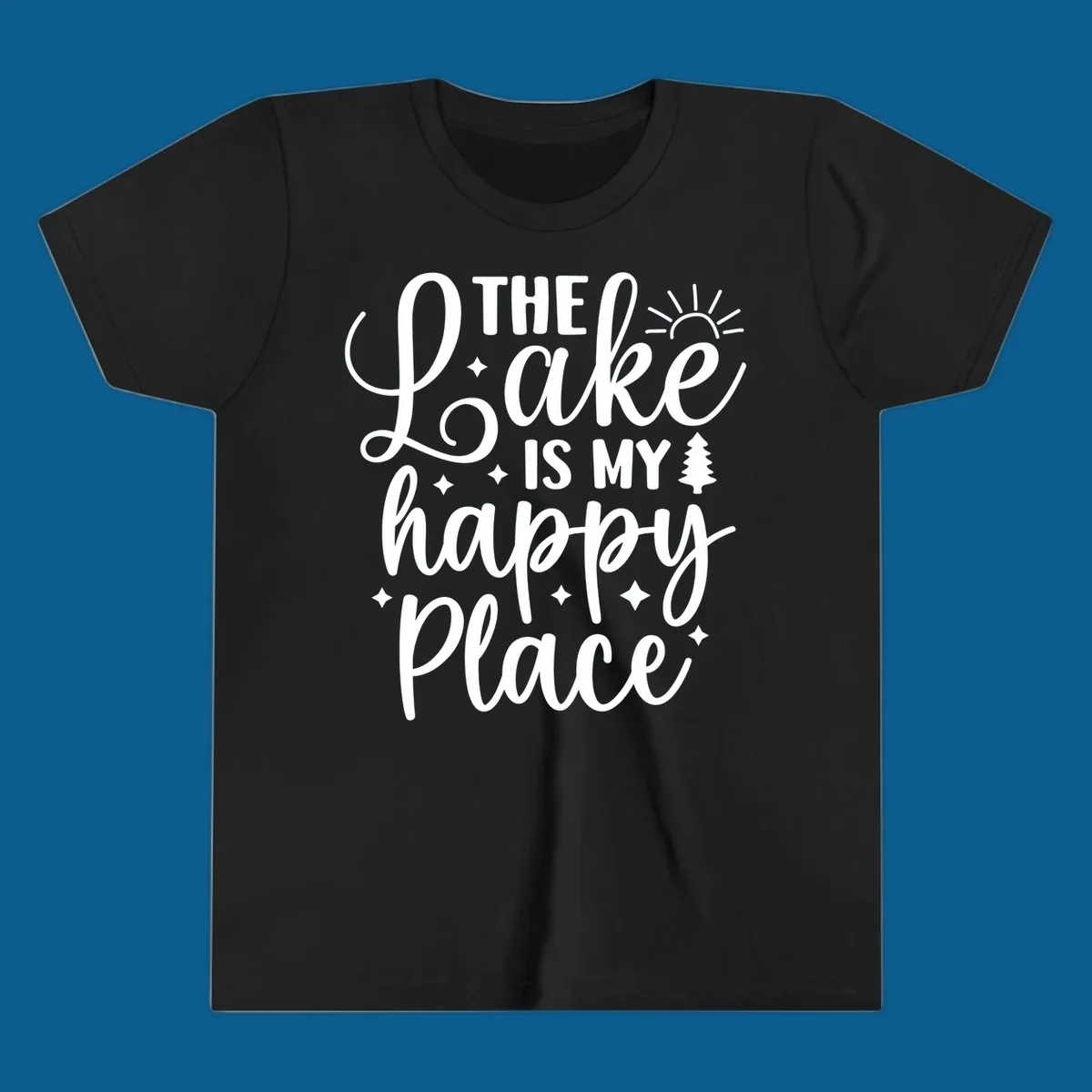The Lake Is My Happy Place text and graphic design with sun, stars, and tree.