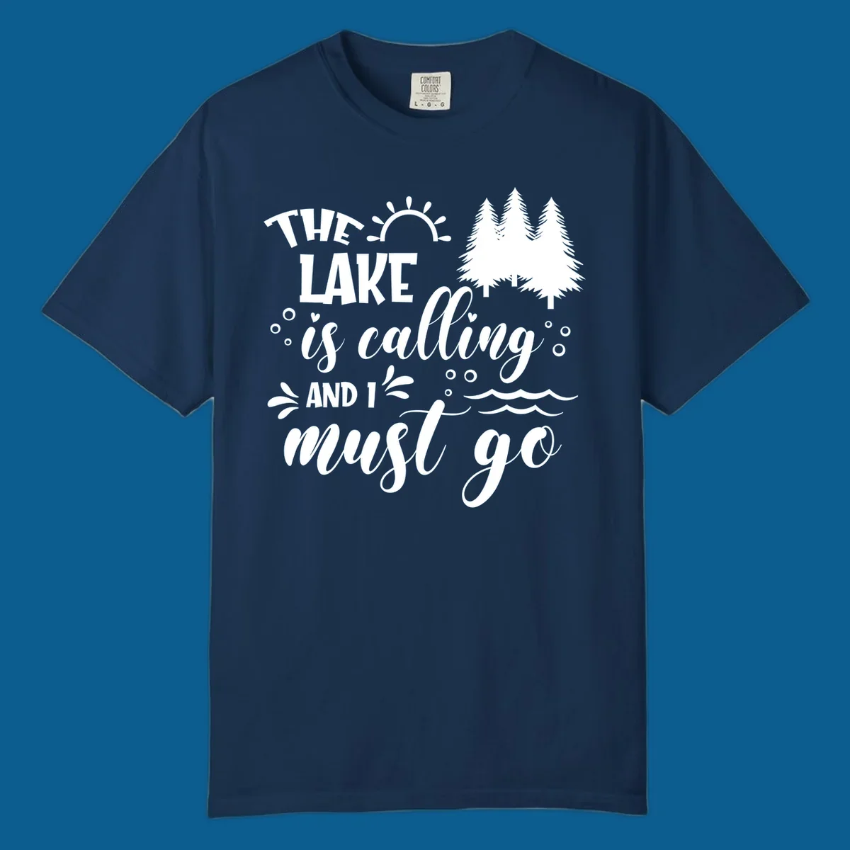 Typography design with 'The Lake Is Calling And I Must Go' phrase and nature elements, for lake life enthusiasts.
