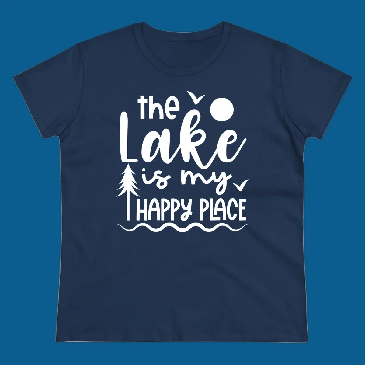 The Lake Is My Happy Place text design with lake elements like a tree, sun, and birds.