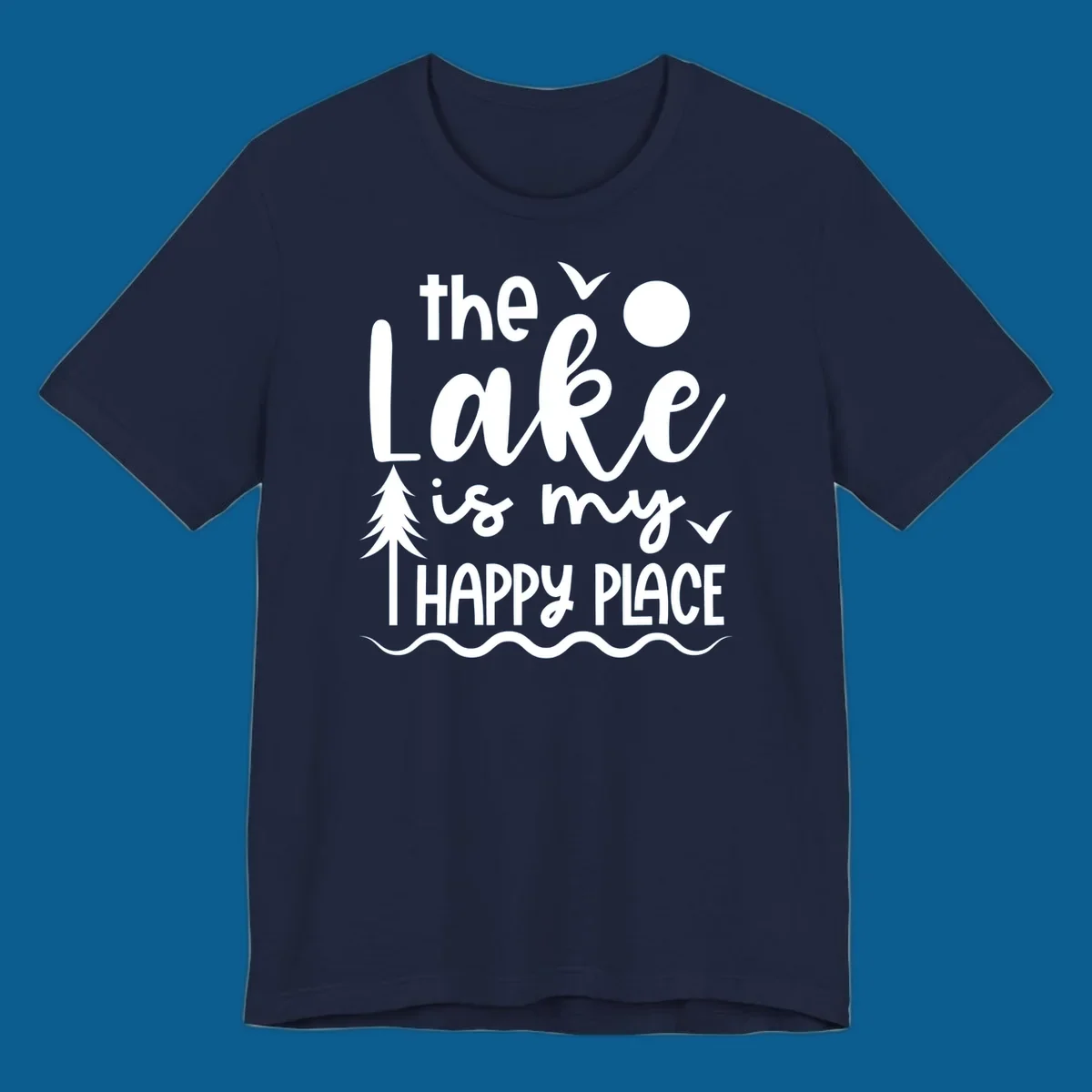 The Lake Is My Happy Place text design with lake elements like a tree, sun, and birds.