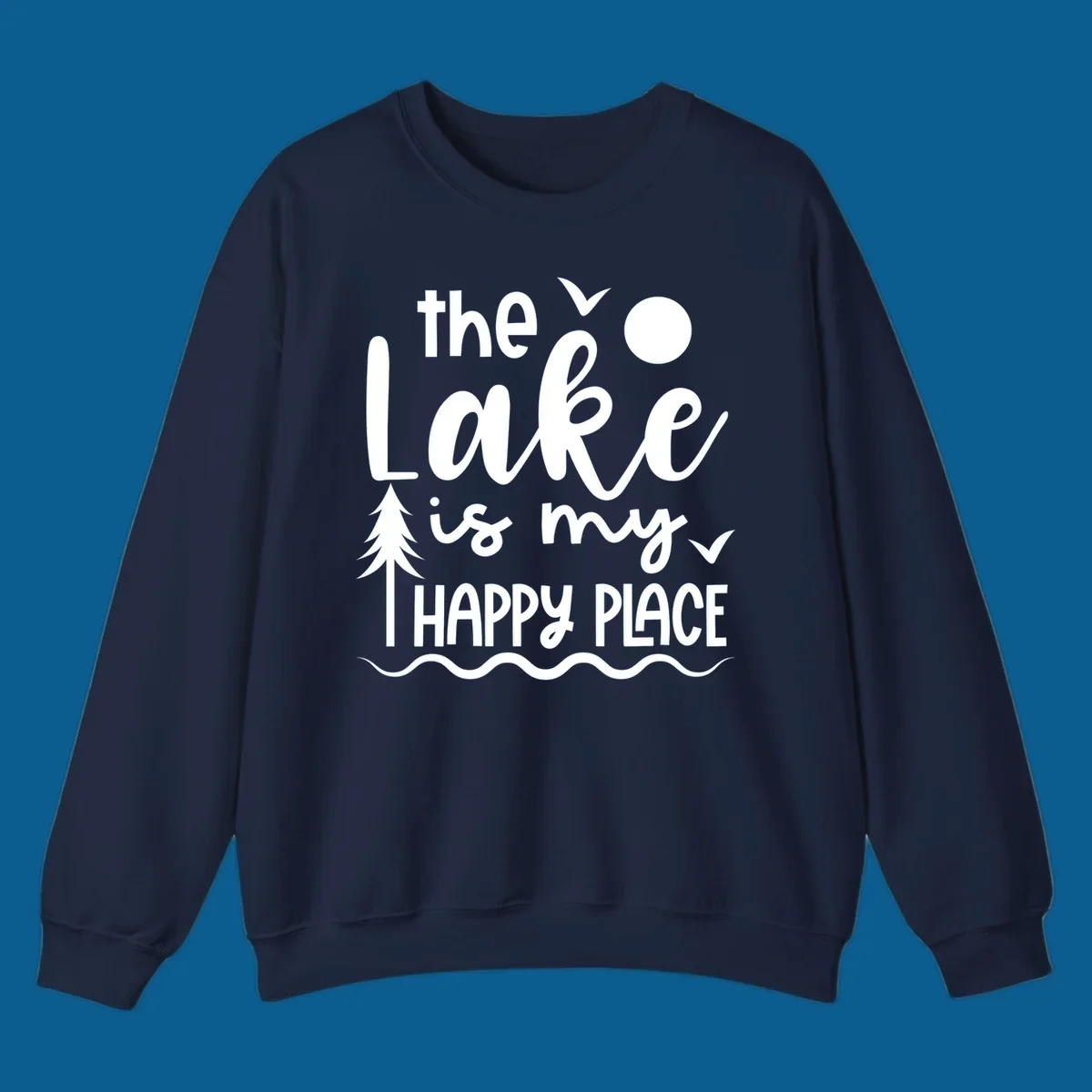 The Lake Is My Happy Place text design with lake elements like a tree, sun, and birds.