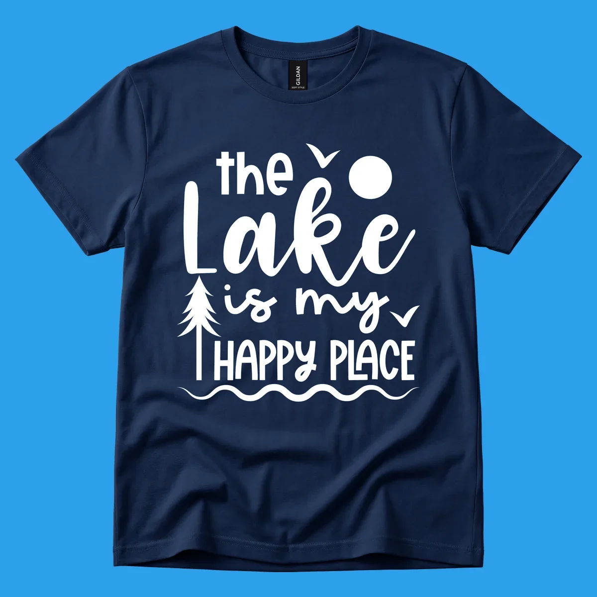 The Lake Is My Happy Place text design with lake elements like a tree, sun, and birds.