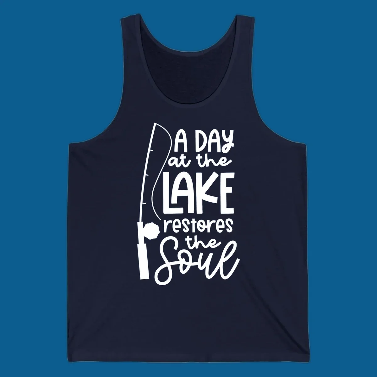 Fishing pole with text "A Day at the Lake Restores the Soul", lake-life concept.