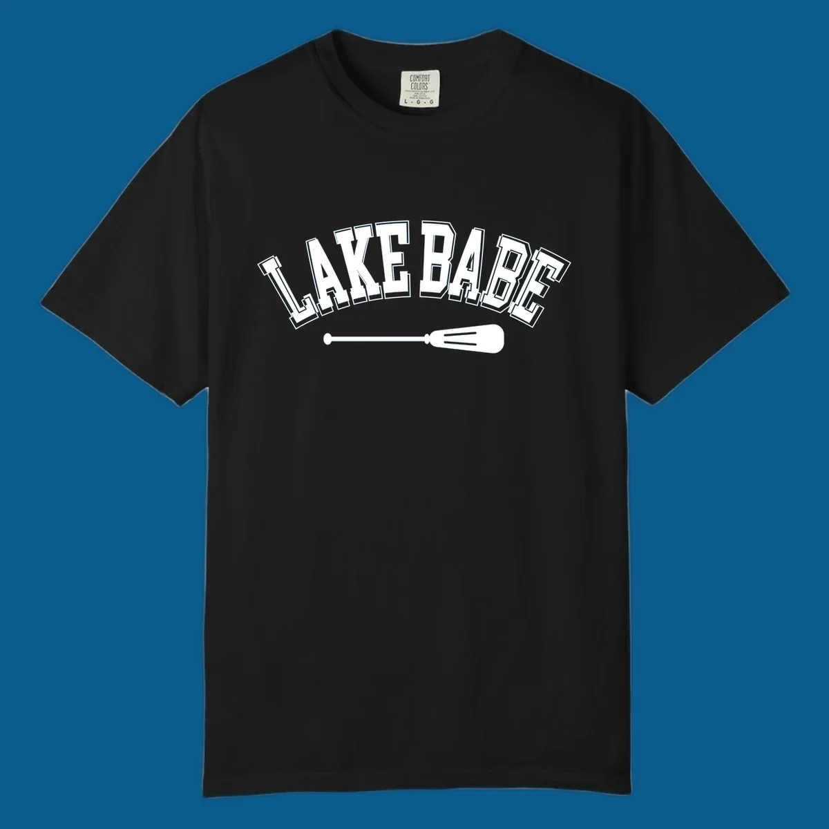 Arched text 'LAKE BABE' with an oar illustration below, representing lake-babe-style.