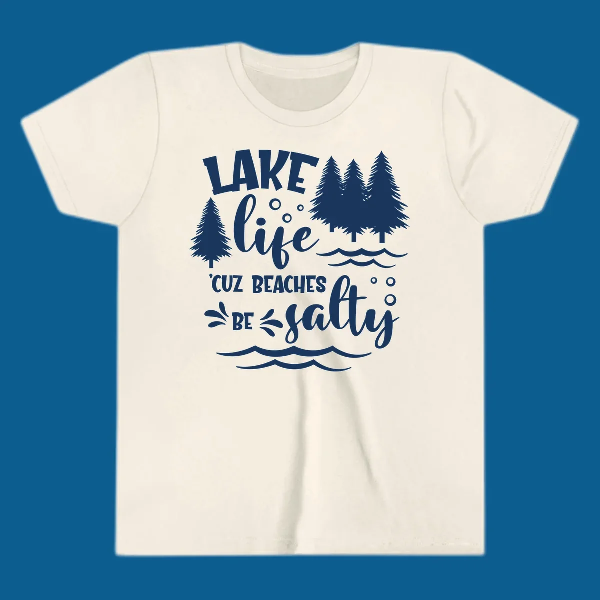 Lake life graphic with text 'LAKE life 'CUZ BEACHES BE salty', pine trees, and water waves.