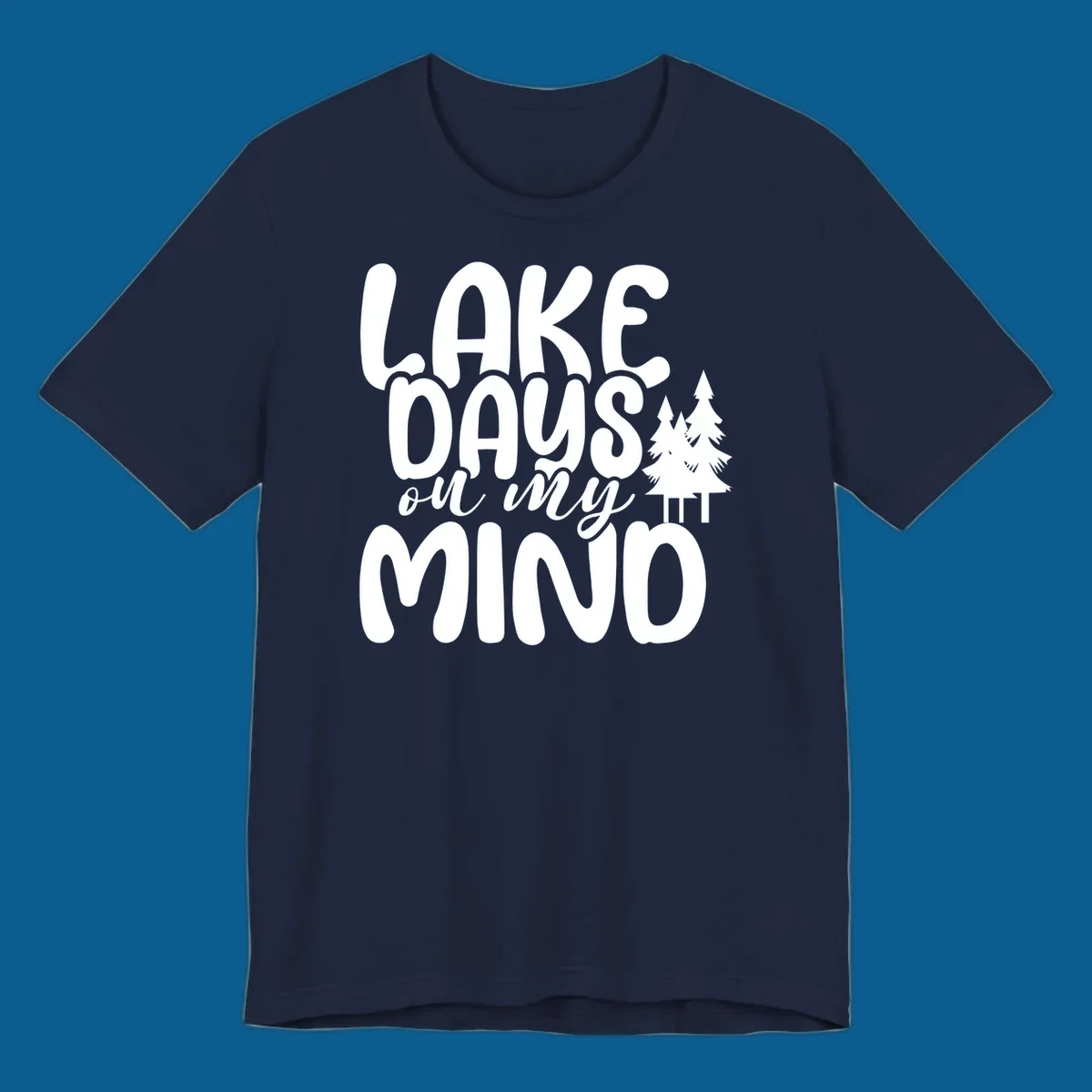 Lake days on my mind graphic with pine trees