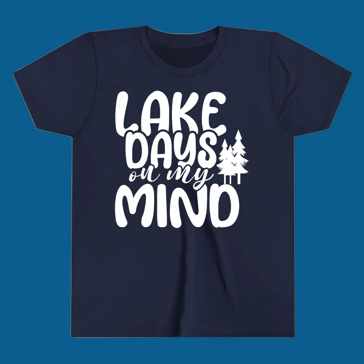 Lake days on my mind graphic with pine trees