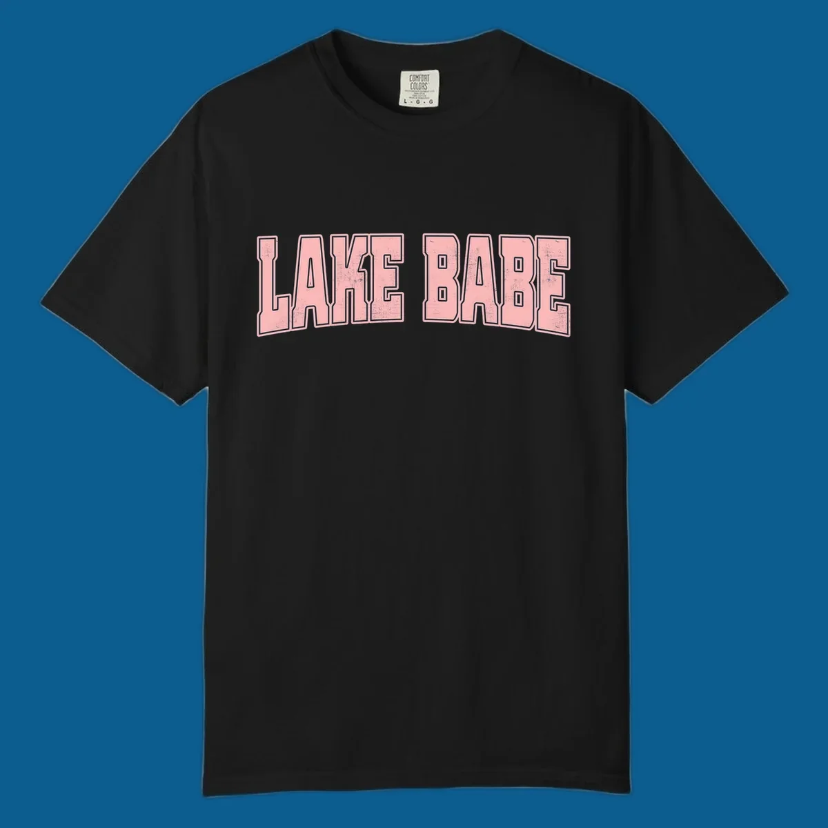 Lake Babe text design in pink with distressed texture and black outline.