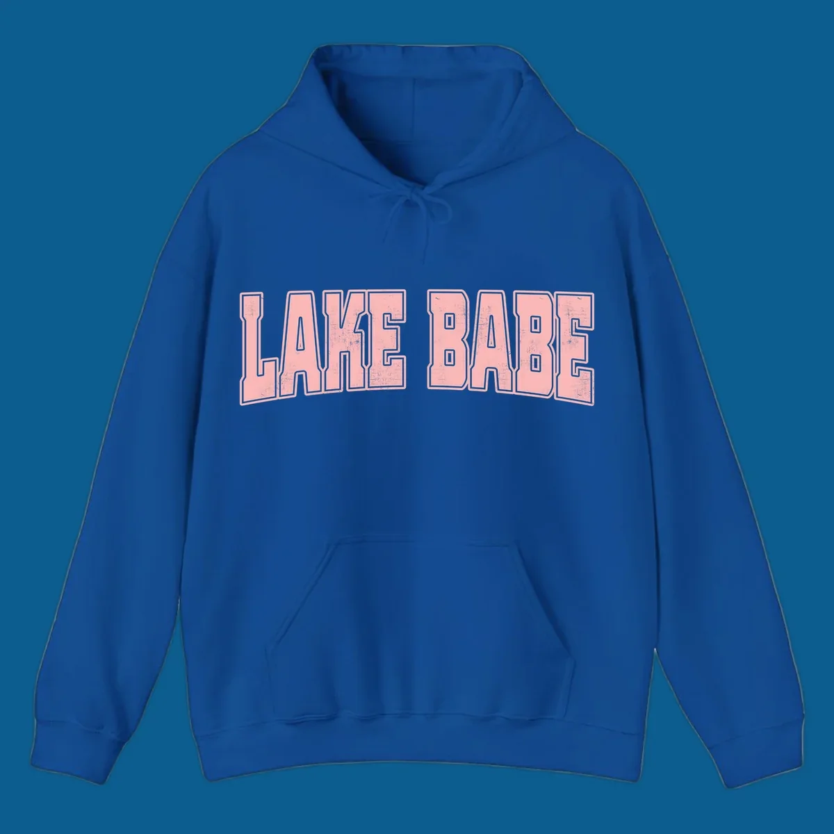 Lake Babe text design in pink with distressed texture and black outline.