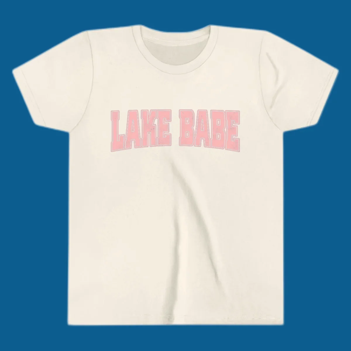 Lake Babe text design in pink with distressed texture and black outline.