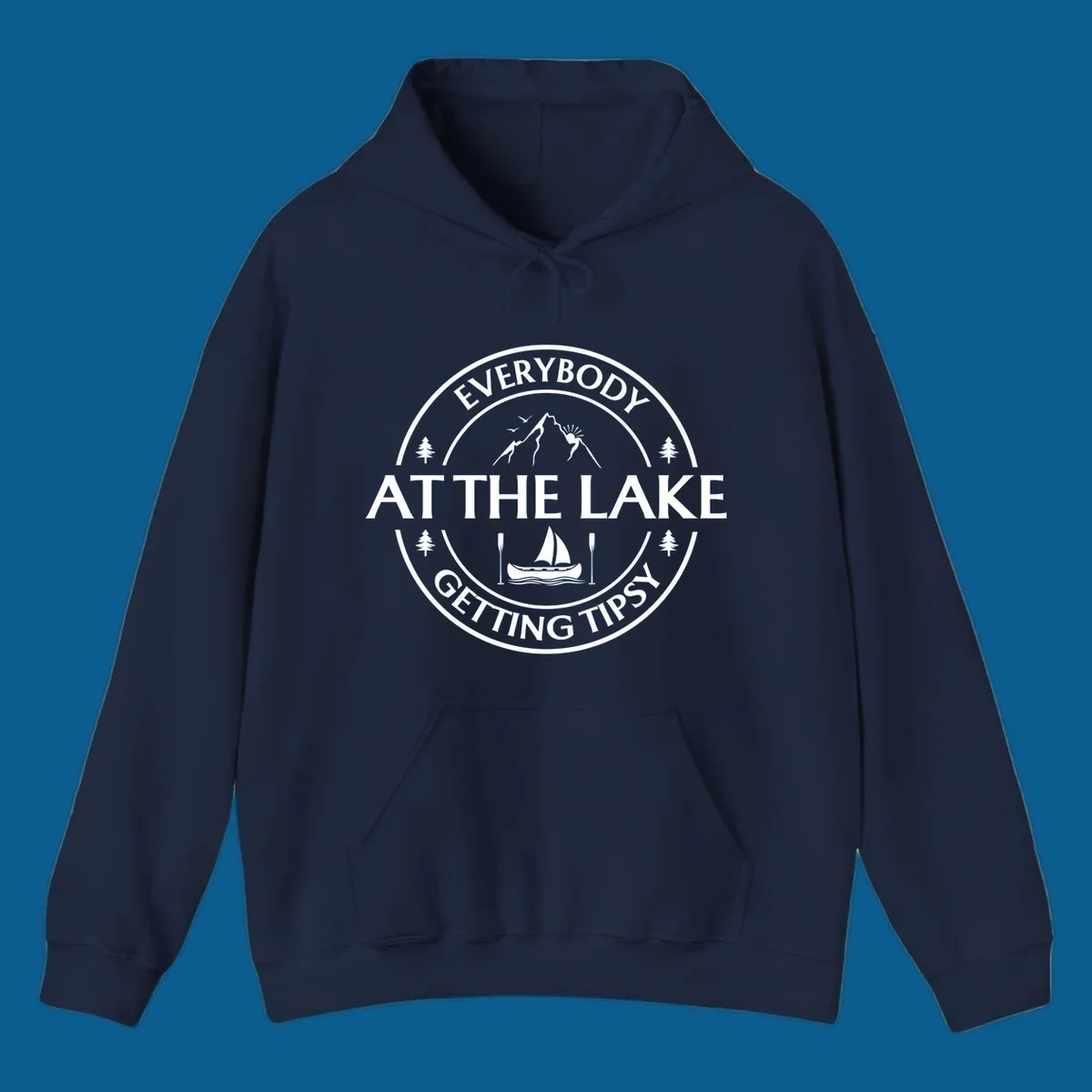 Circular badge design for lake life featuring mountains, canoe, and text 'Everybody At The Lake Getting Tipsy'.