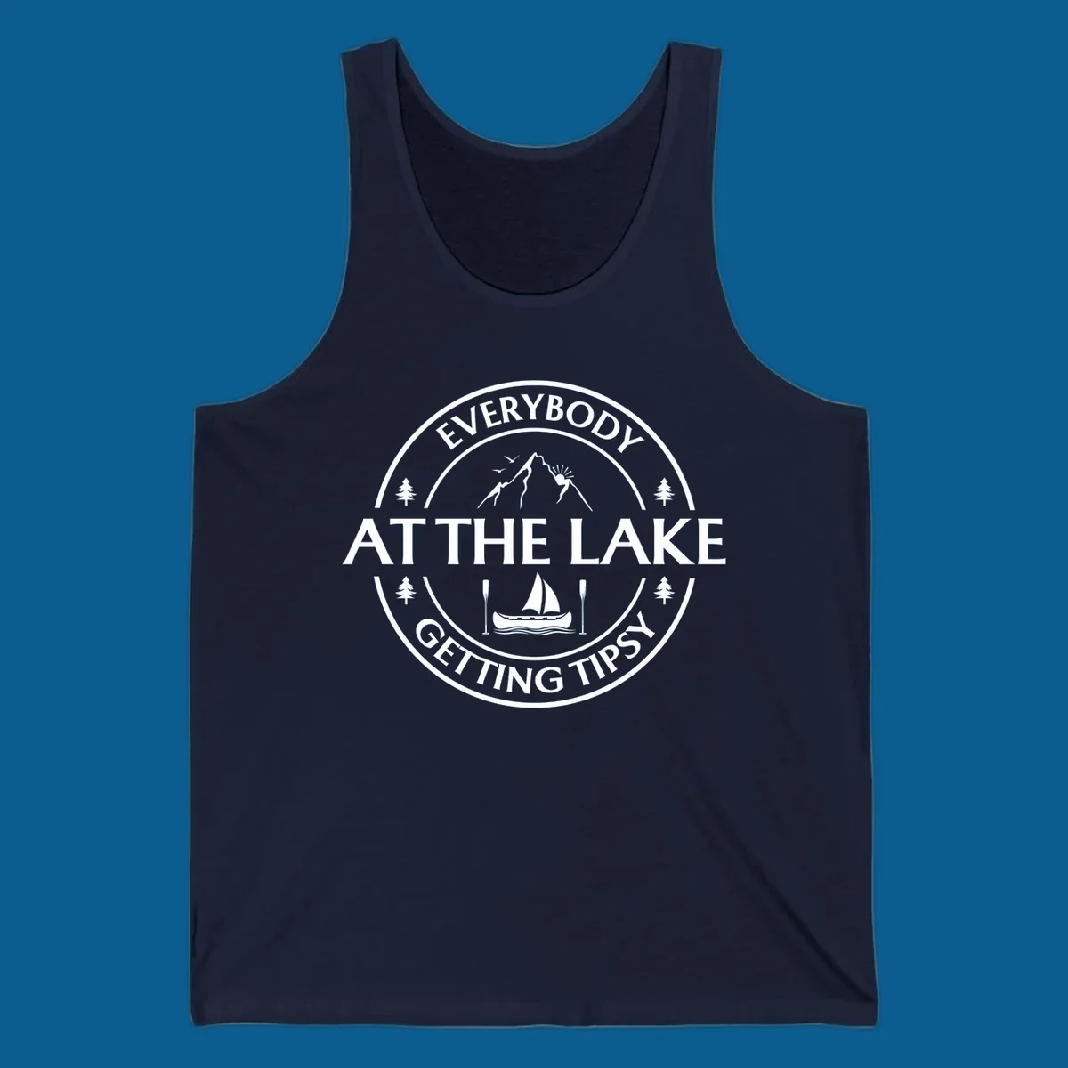 Circular badge design for lake life featuring mountains, canoe, and text 'Everybody At The Lake Getting Tipsy'.