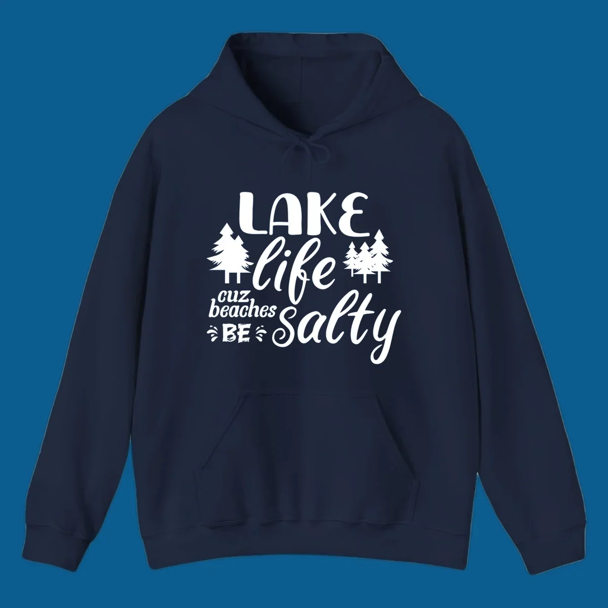 Lake life cuz beaches be salty text and pine trees graphic.