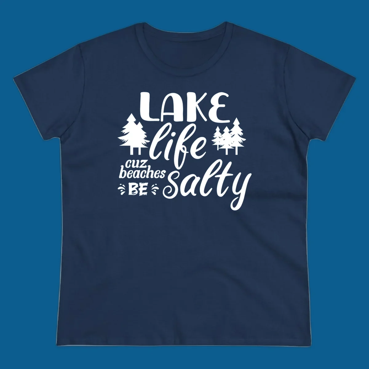 Lake life cuz beaches be salty text and pine trees graphic.
