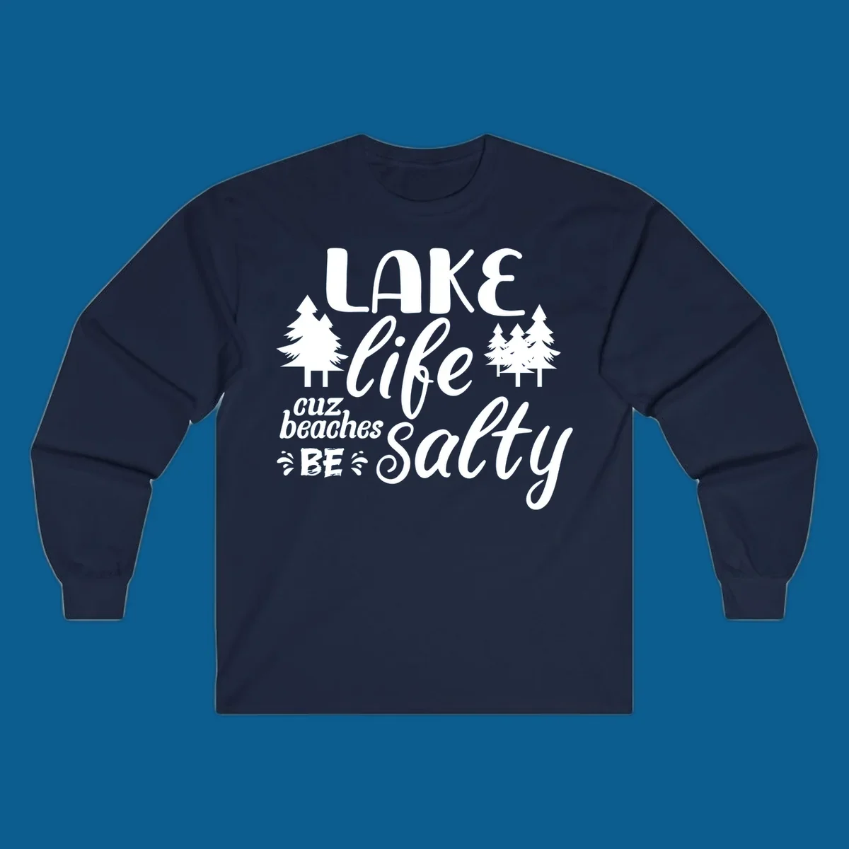 Lake life cuz beaches be salty text and pine trees graphic.