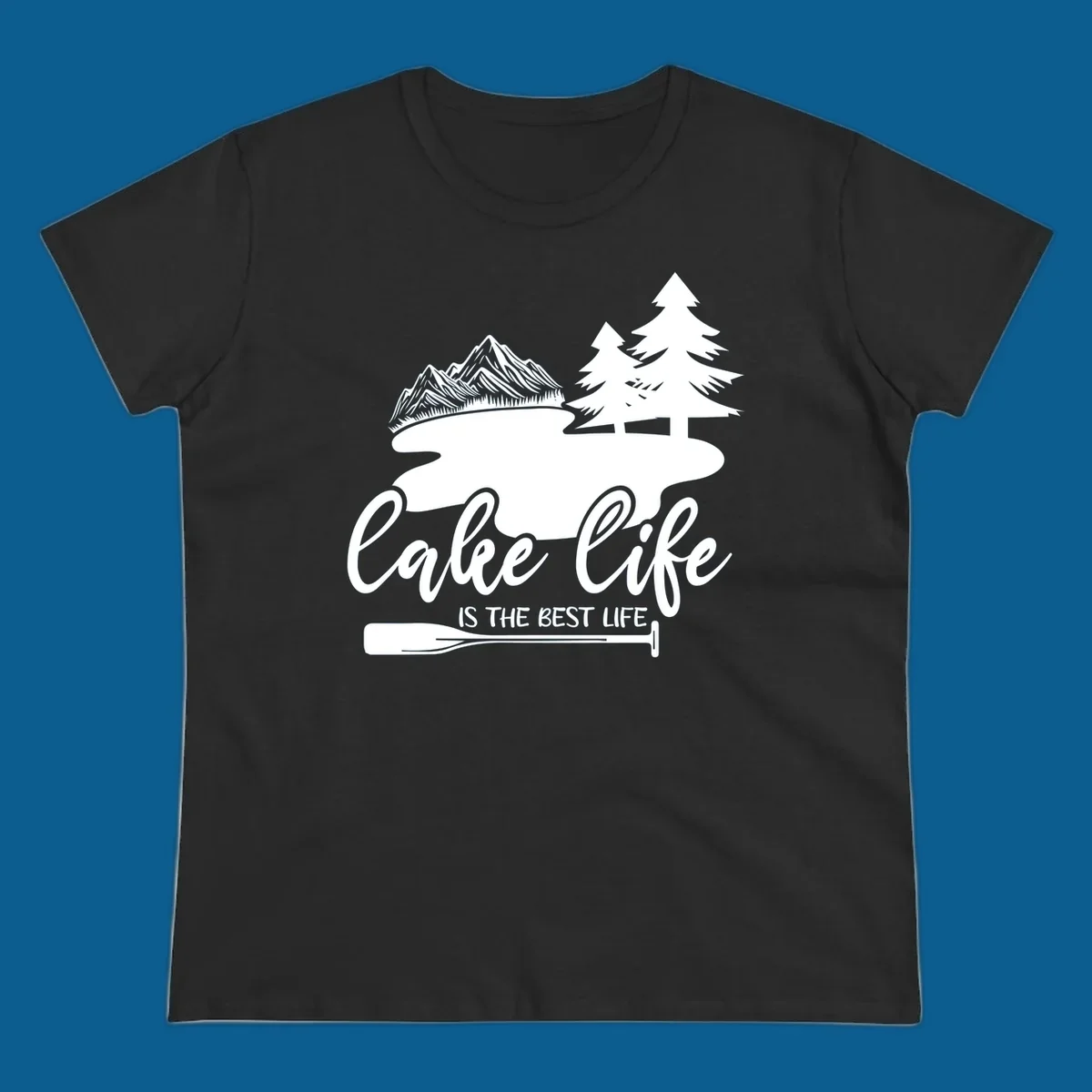 Lake life is the best life design with mountains, trees, lake, and paddle graphic.