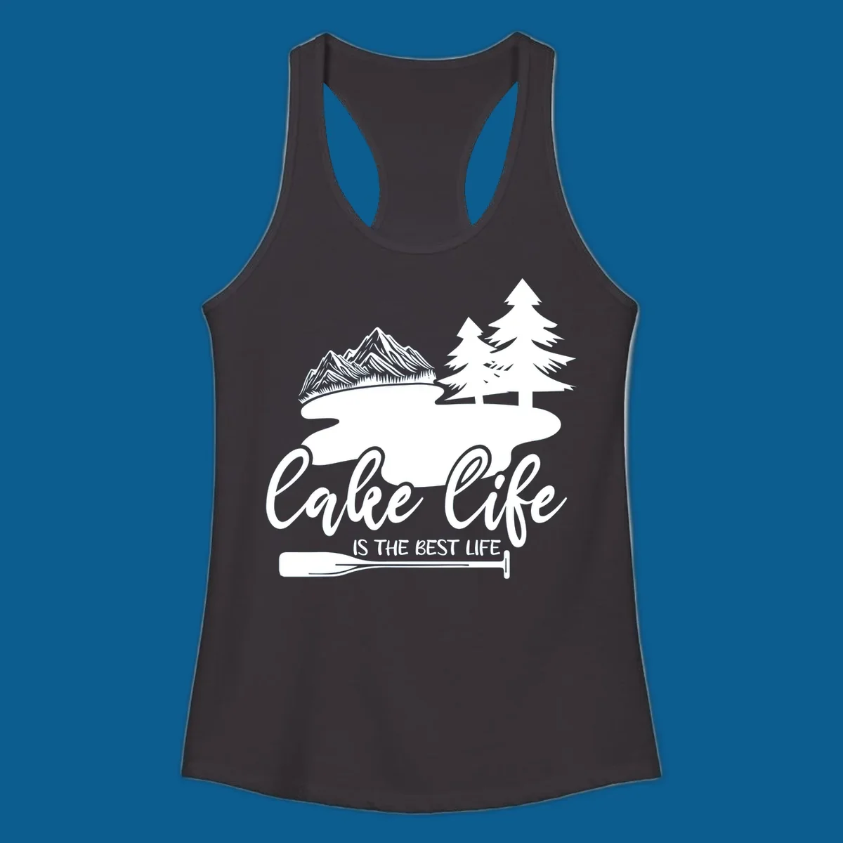 Lake life is the best life design with mountains, trees, lake, and paddle graphic.