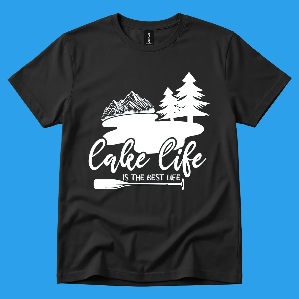 Lake life is the best life design with mountains, trees, lake, and paddle graphic.