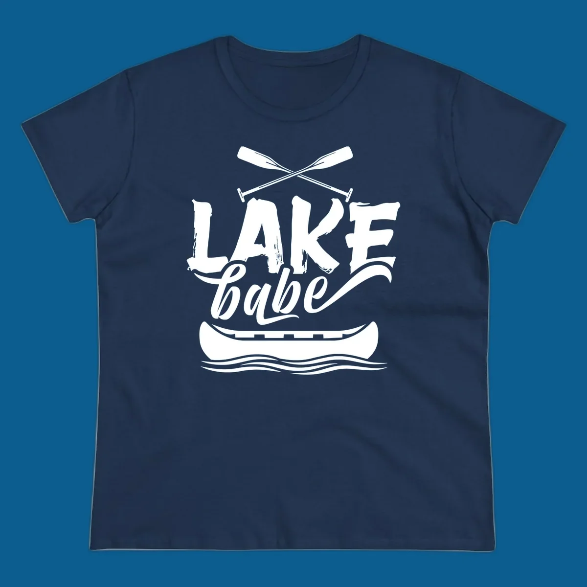 Lake babe text with canoe and oars on water. Primary keyword: lake-babe-canoe