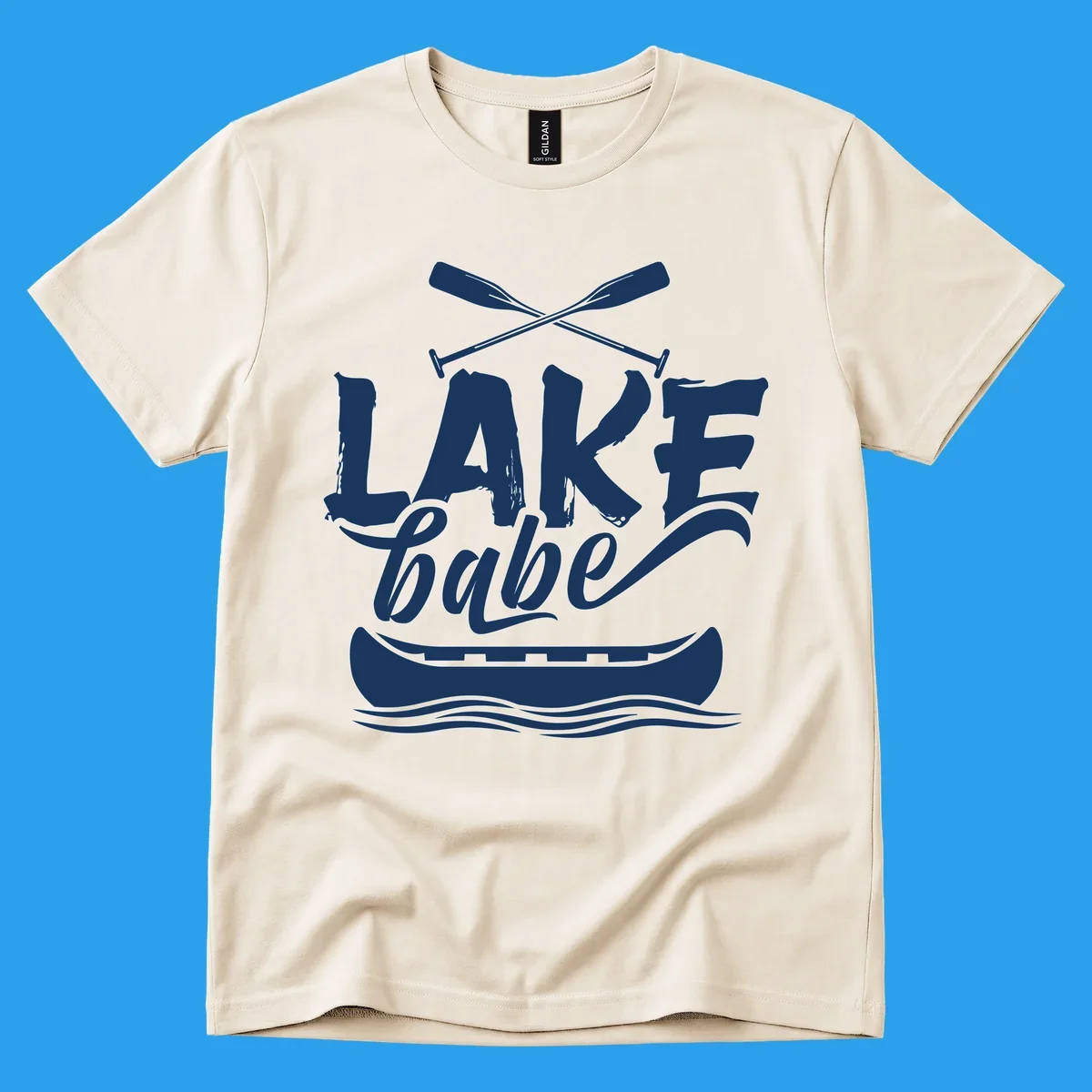 Lake babe text with canoe and oars on water. Primary keyword: lake-babe-canoe