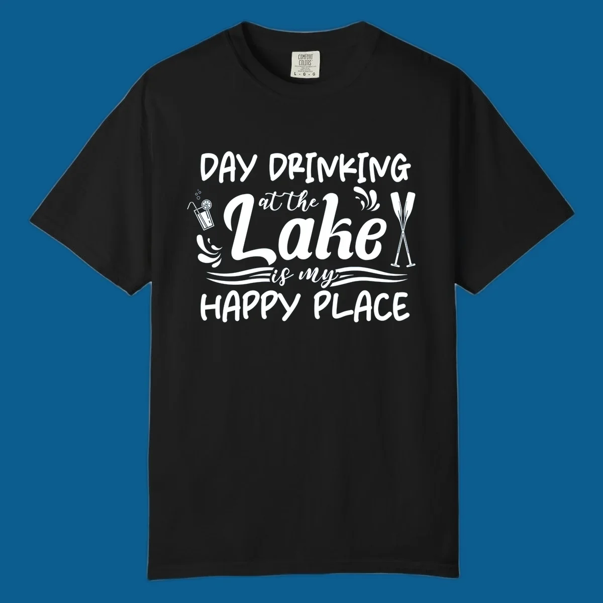 Typography design 'Day Drinking at the Lake is My Happy Place' with lake-themed illustrations.
