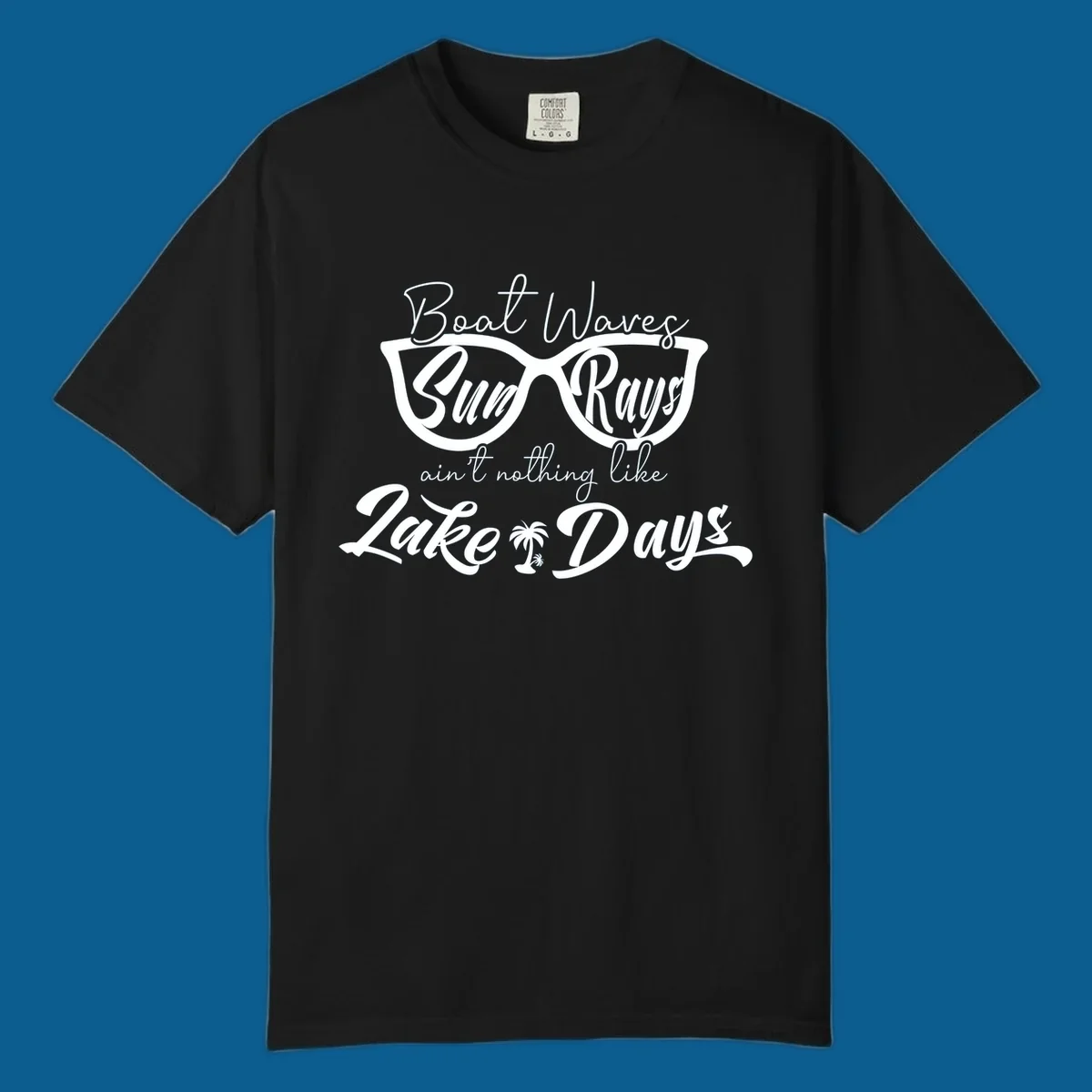 Boat Waves Sun Rays ain't nothing like Lake Days design with sunglasses and palm tree.