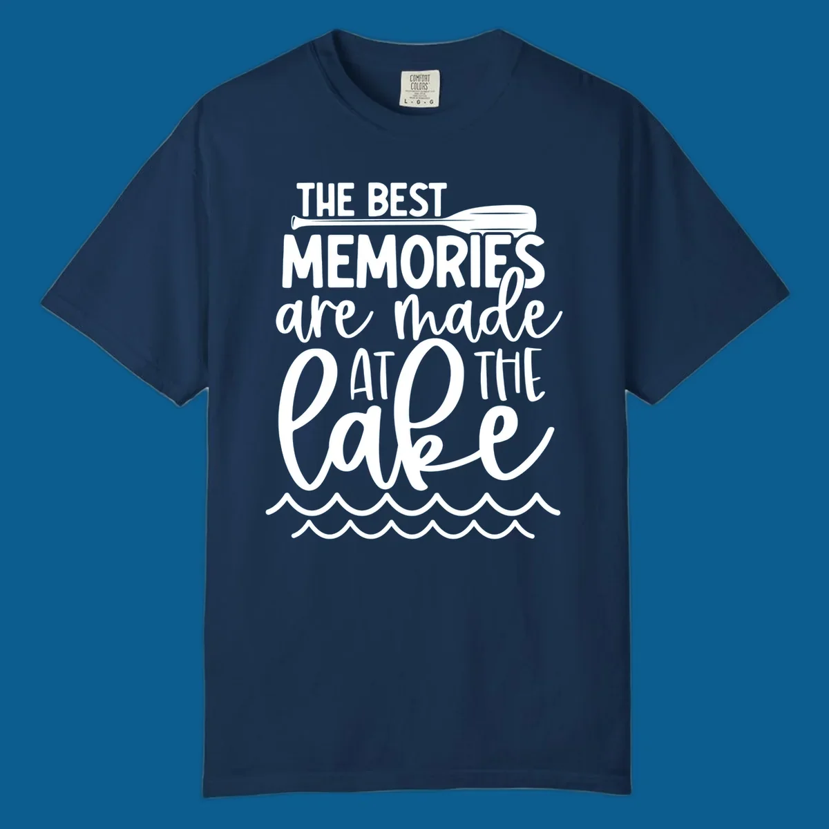 The best memories are made at the lake typography with paddle and waves.
