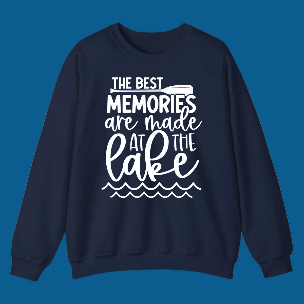 The best memories are made at the lake typography with paddle and waves.