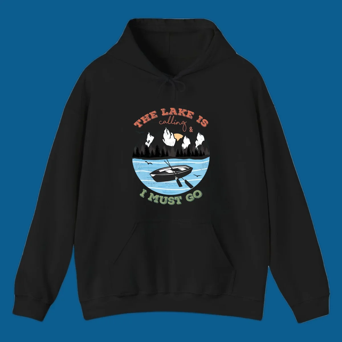 The lake is calling and I must go mountain lake scene with rowboat graphic