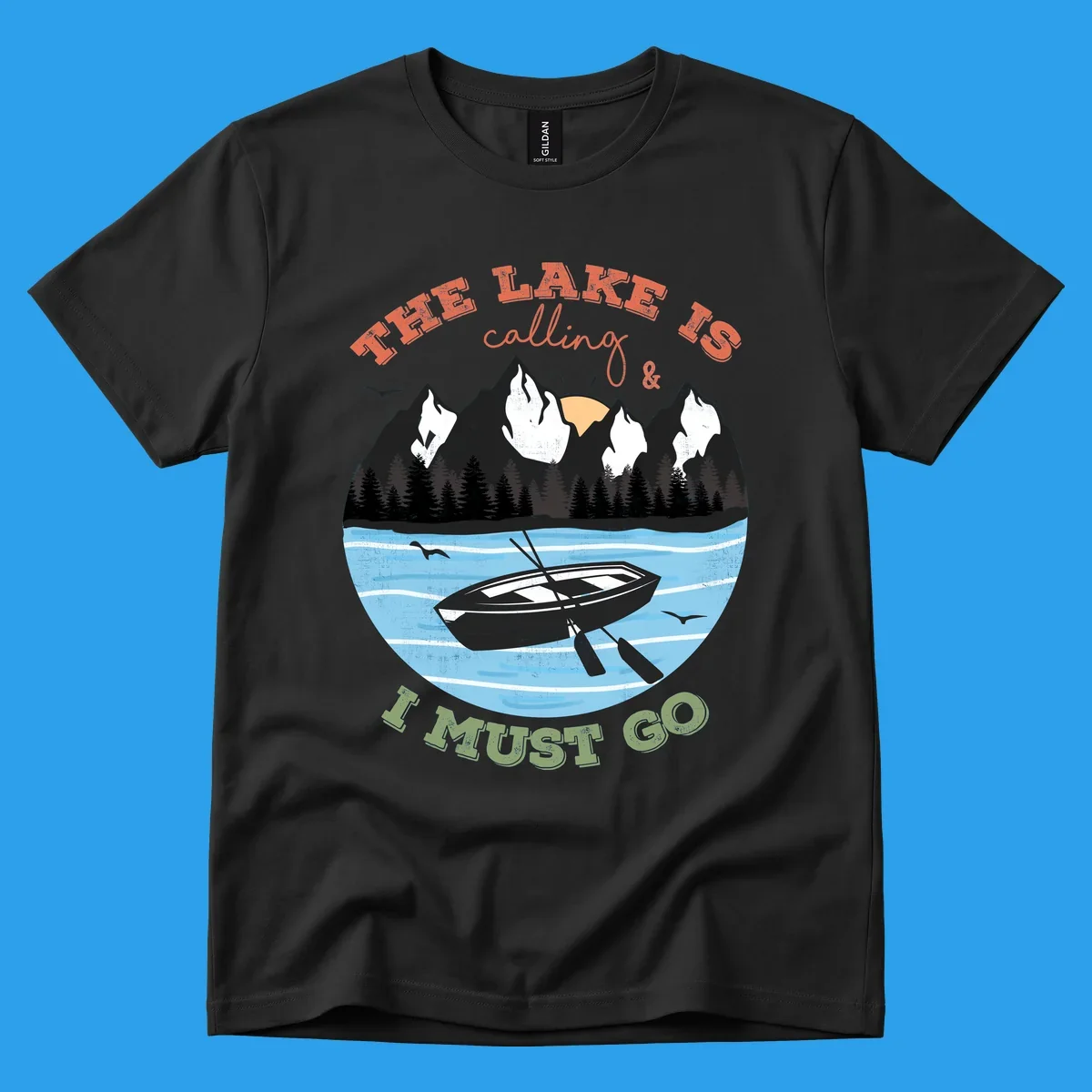 The lake is calling and I must go mountain lake scene with rowboat graphic
