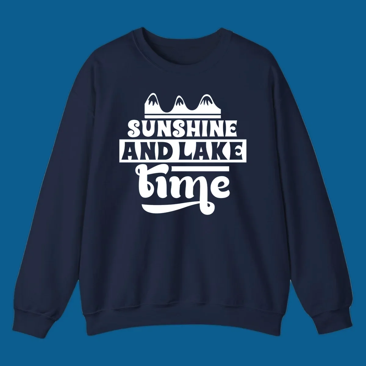 Sunshine and lake time graphic with mountains, white and navy.