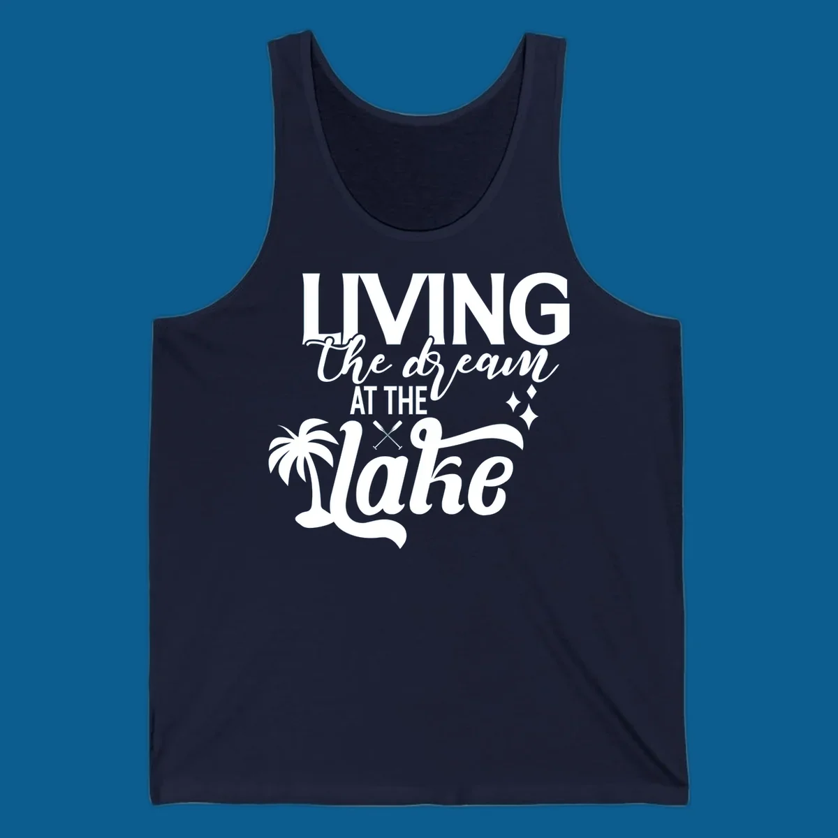 Living the dream at the lake text with palm tree and oars graphic