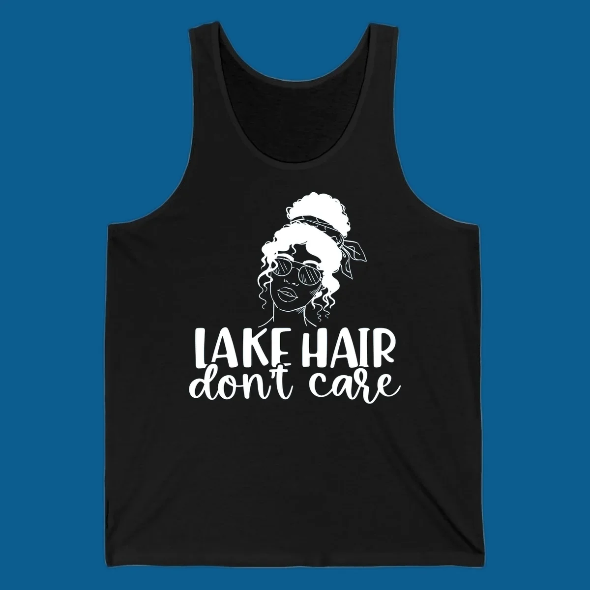 Illustration of a woman with sunglasses and messy bun, with text 'Lake Hair Don't Care'.