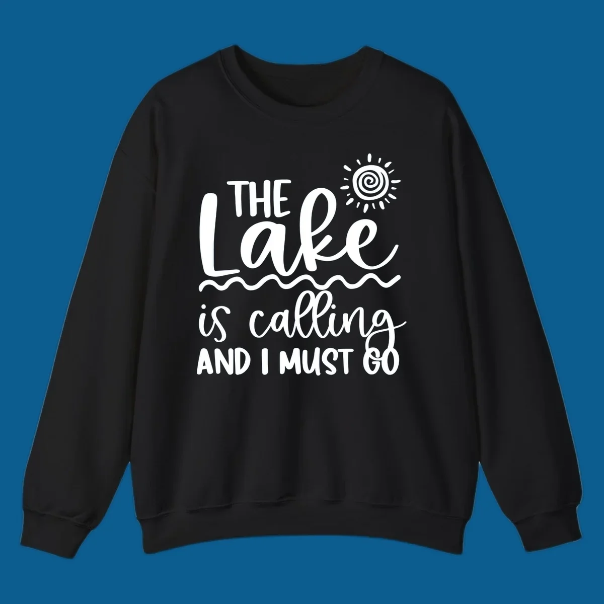 The lake is calling and I must go typography with sun and waves graphic