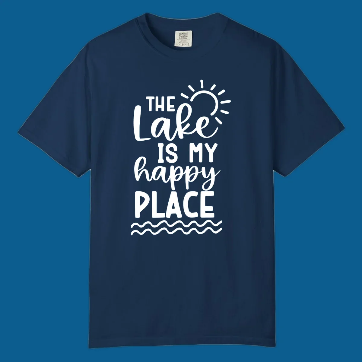 The Lake Is My Happy Place text design with sun and waves graphic.