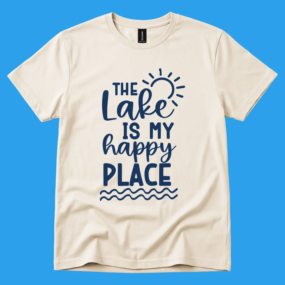 The Lake Is My Happy Place text design with sun and waves graphic.