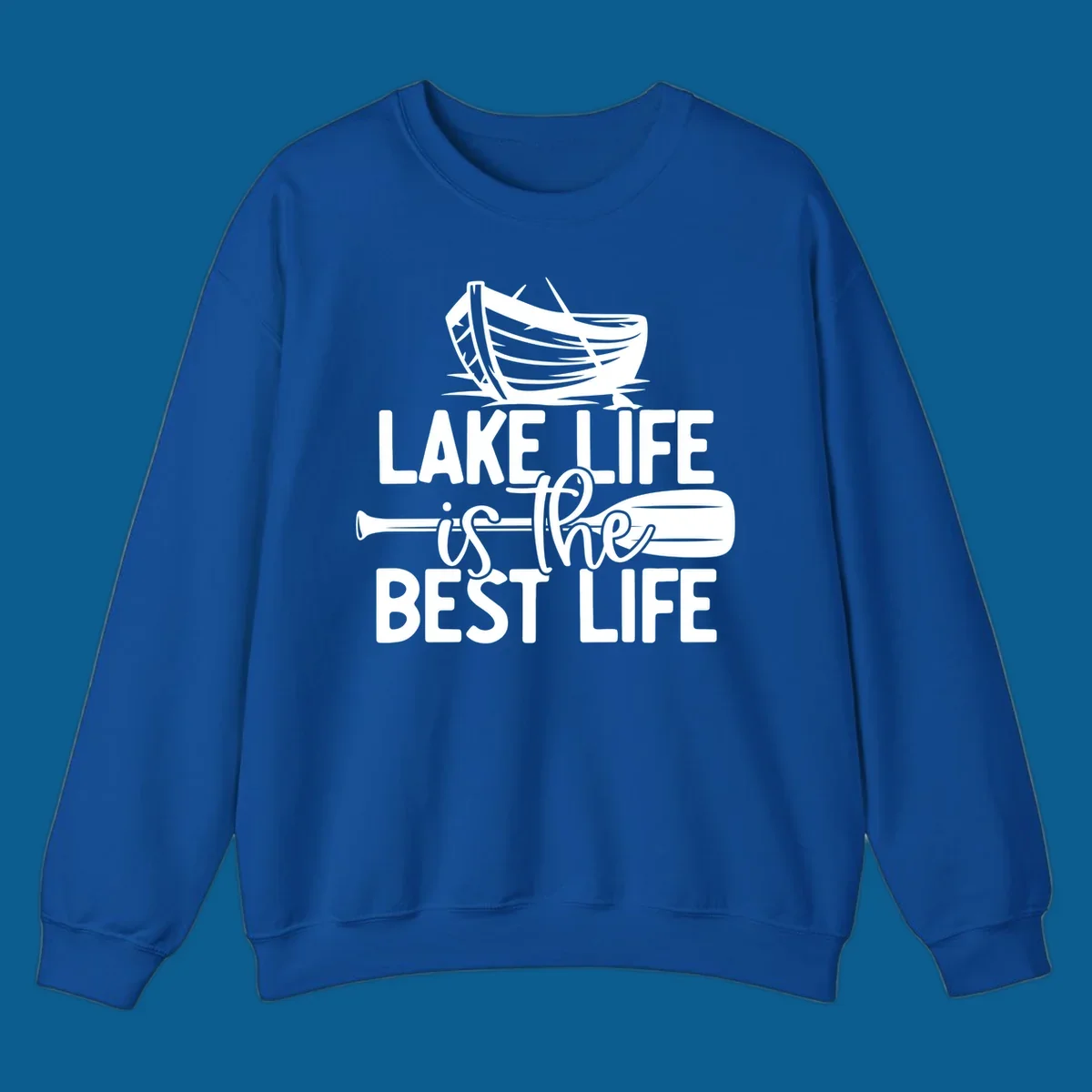 Lake life is the best life text and graphics featuring a rowboat and oar.