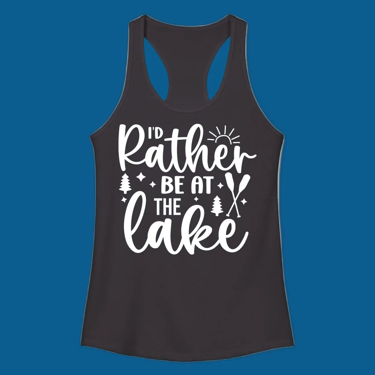 I'd Rather Be At The Lake typography design with sun rays, trees, and oars.