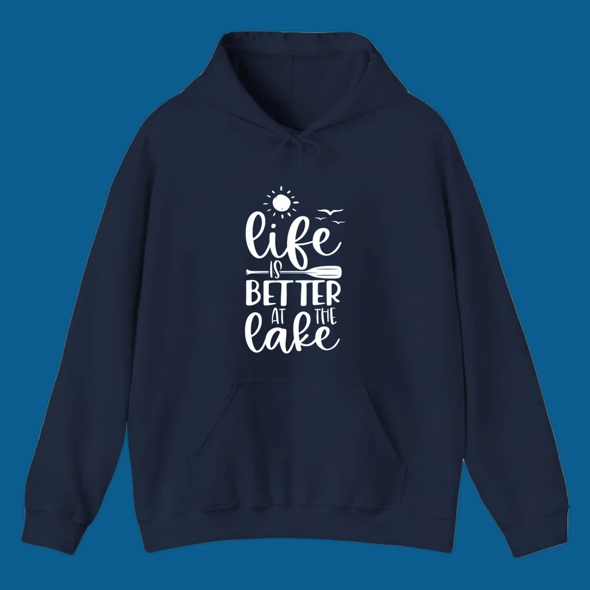 Life is better at the lake quote with sun, birds, and oar graphic.