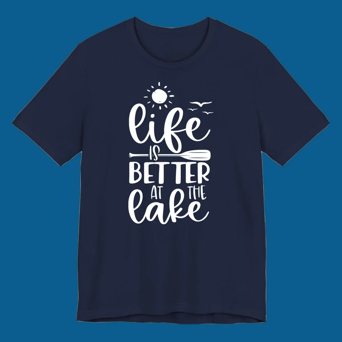 Life is better at the lake quote with sun, birds, and oar graphic.