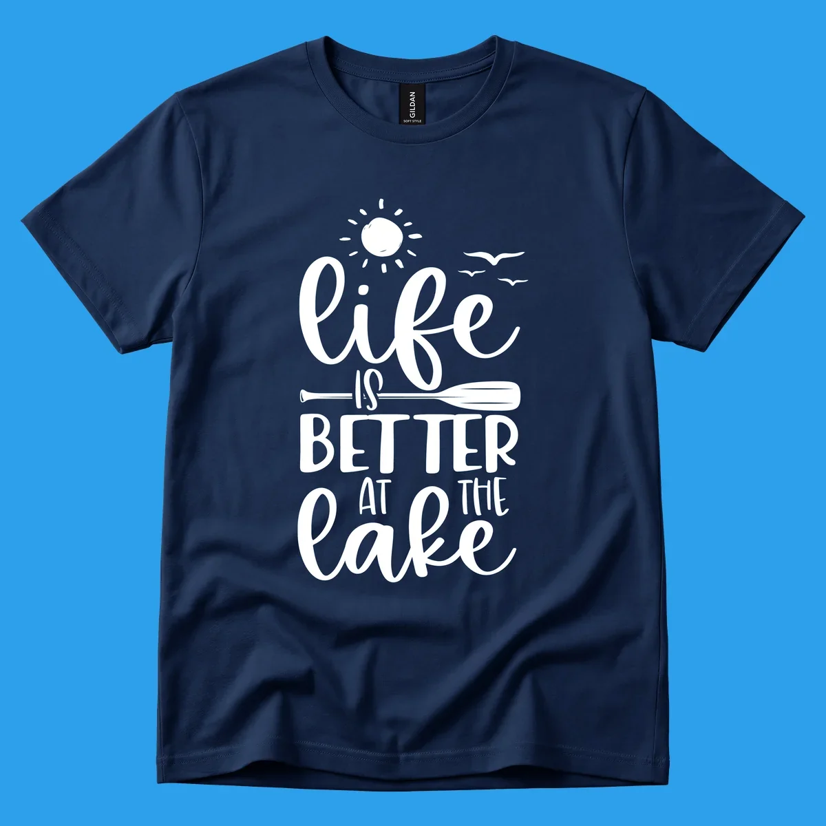Life is better at the lake quote with sun, birds, and oar graphic.