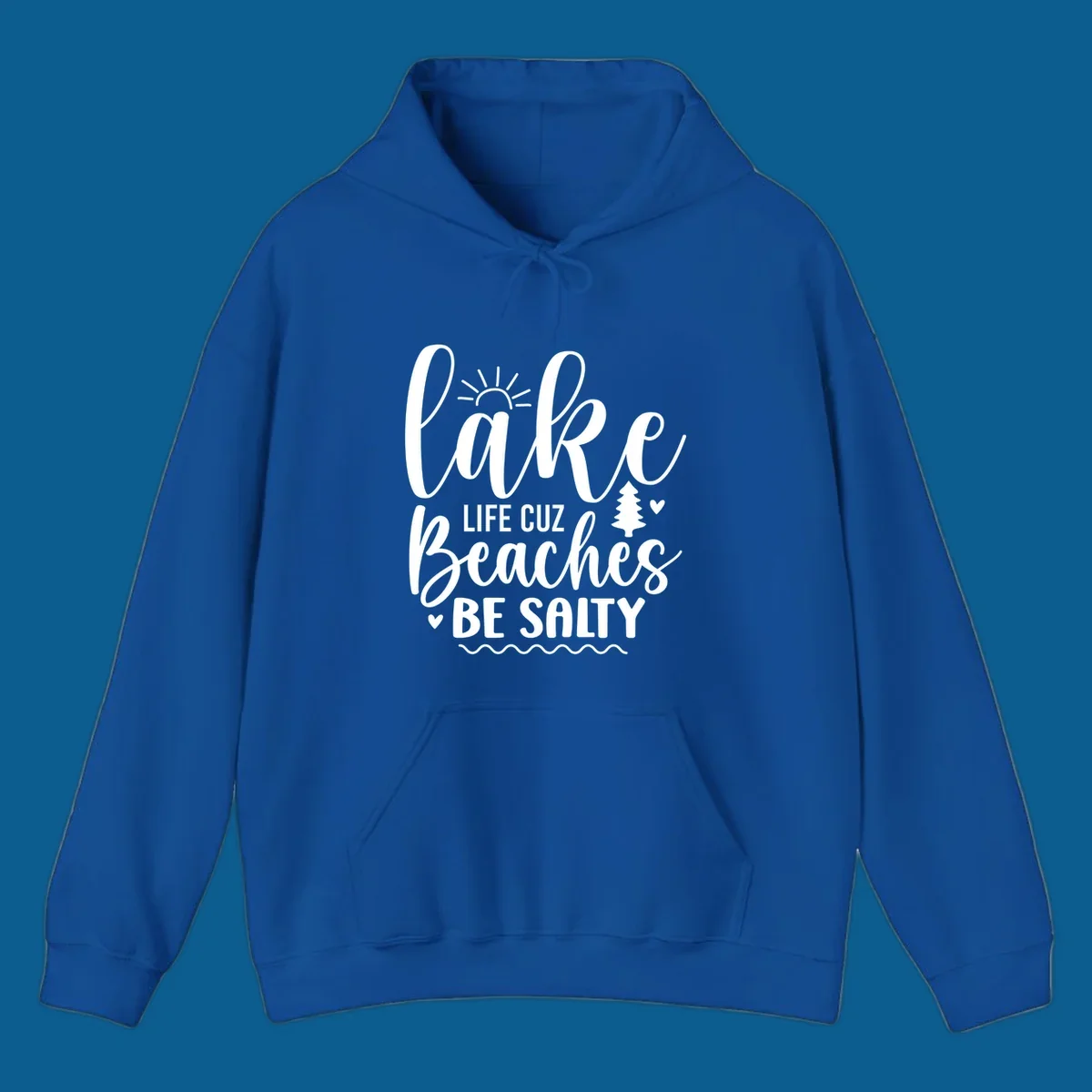 Lake life cuz beaches be salty text design with sun and tree elements.