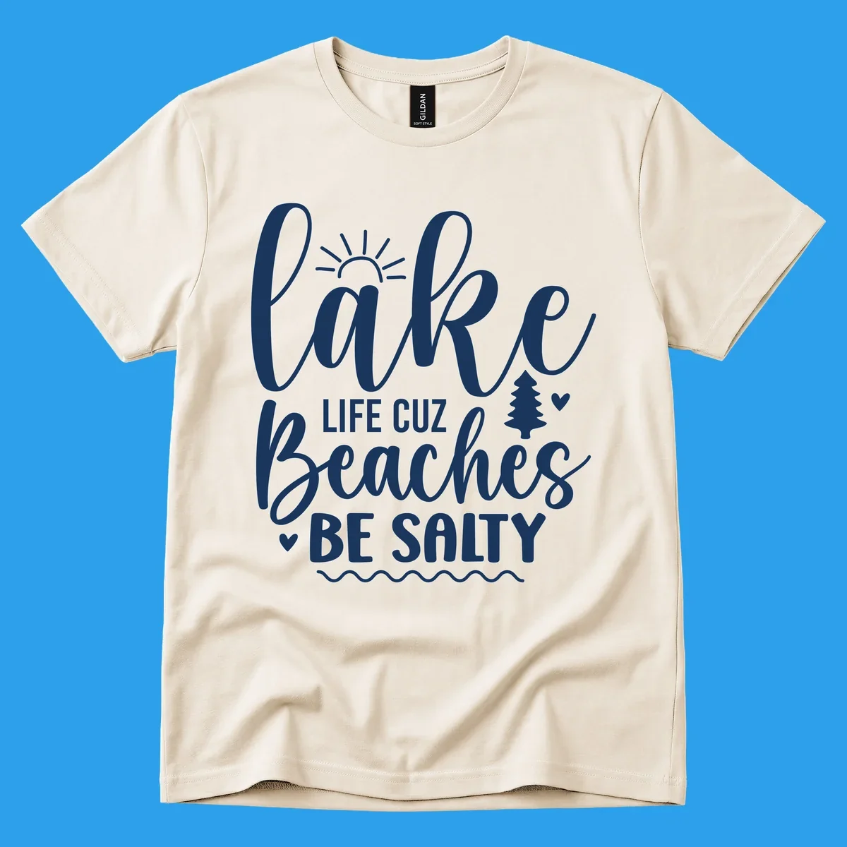 Lake life cuz beaches be salty text design with sun and tree elements.
