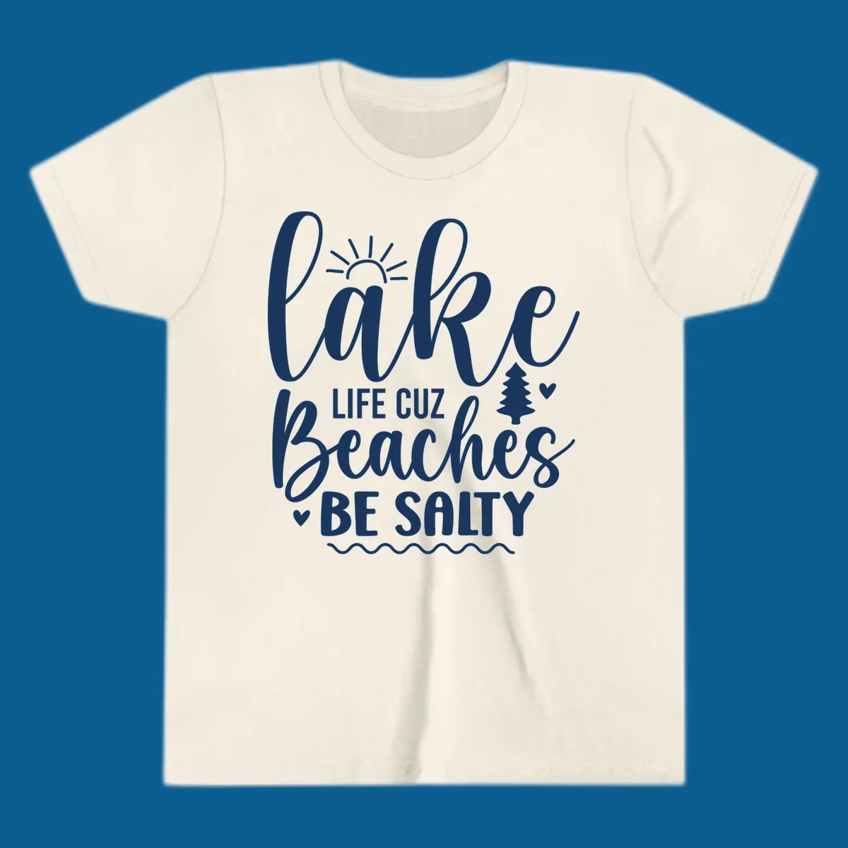 Lake life cuz beaches be salty text design with sun and tree elements.