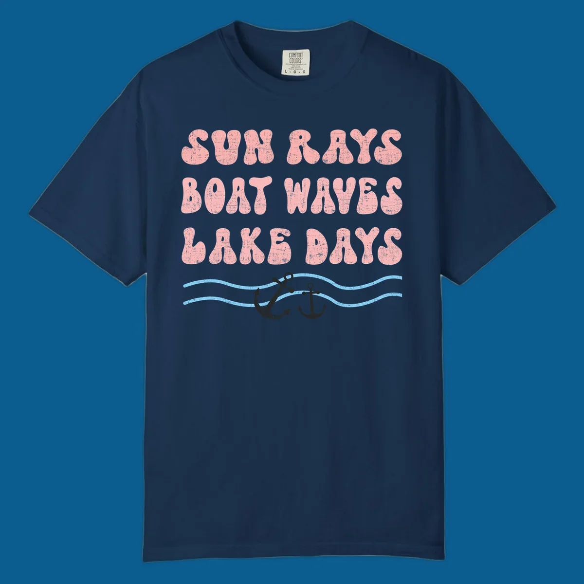 Lake days boat waves sun rays text with anchors and waves.