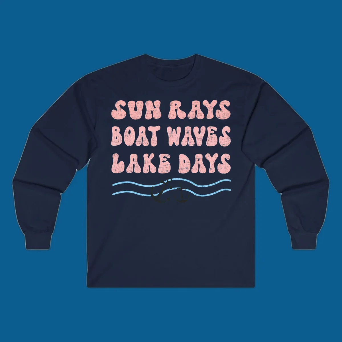 Lake days boat waves sun rays text with anchors and waves.