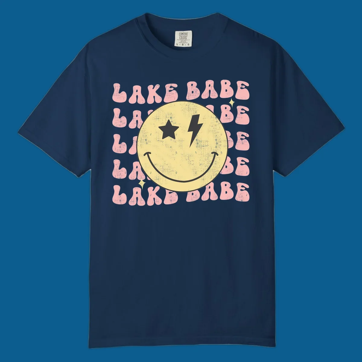Retro lake babe smiley face graphic with groovy text.