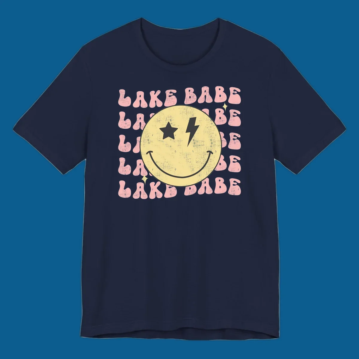 Retro lake babe smiley face graphic with groovy text.