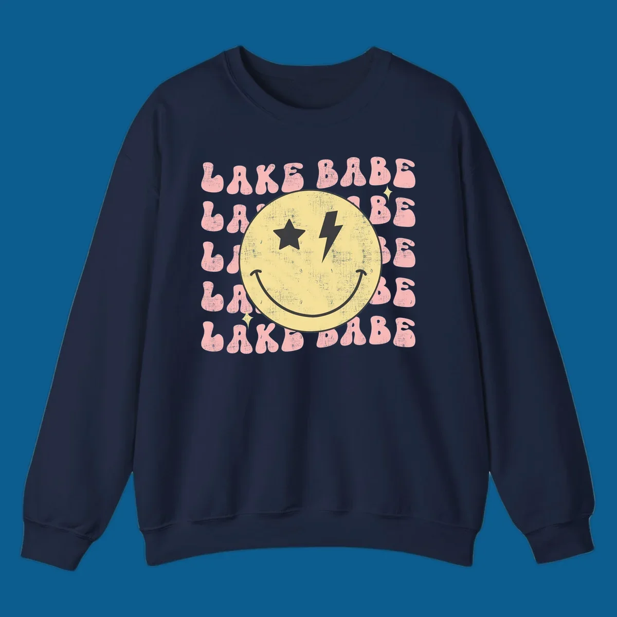 Retro lake babe smiley face graphic with groovy text.